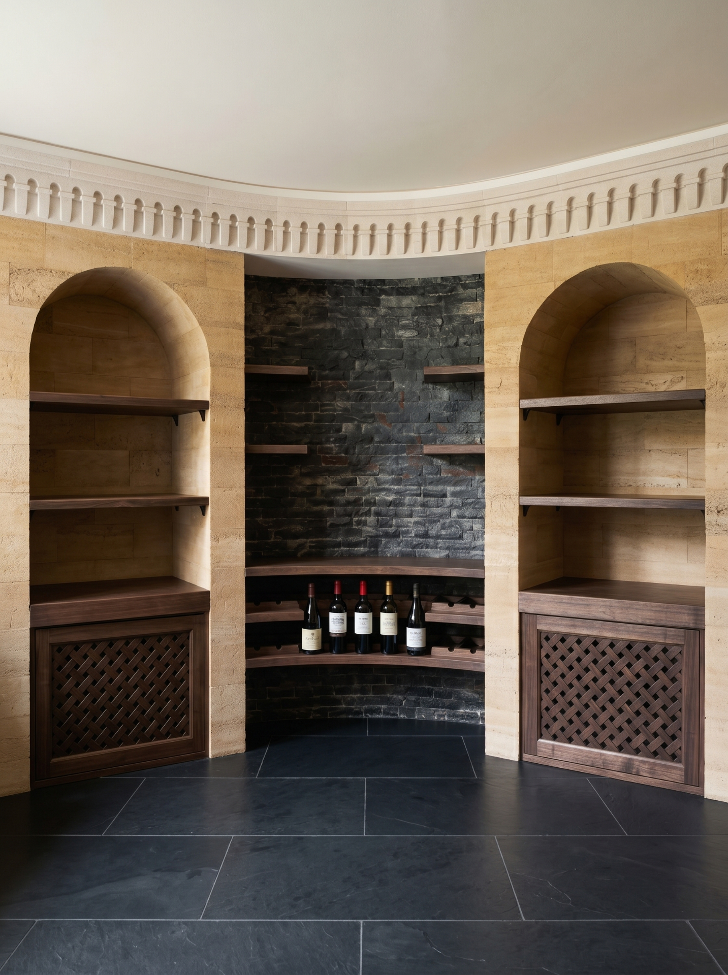Curved stone wine vault with bespoke walnut shelving and lattice cabinets